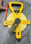Komelon 6622 Fiberglass Tape Measure 200 Ft L X 1/2" W Black/yellow New Other. Fixed Price $24.95.
