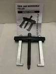 Performance Tool W87135, Twin Jaw Puller, Reversible. 4 Reach, 4-5/8 Spread. Fixed Price $28.95.