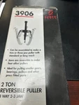 Sunex 3906 2 Ton Capacity 8 Way And/or 3 Jaw Reversible Puller. Fixed Price $20.00.